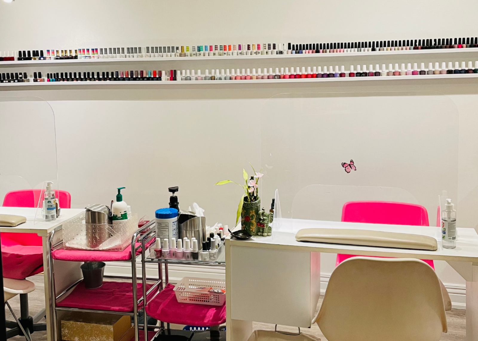 Nail stations inside Glitter Spa.